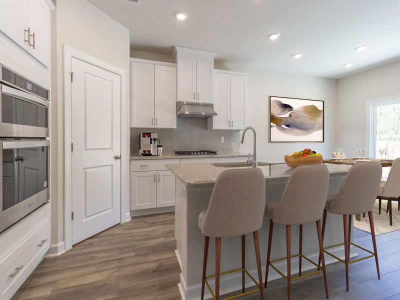 The gourmet kitchen is fitted with a walk-in pantry and designer finishes.