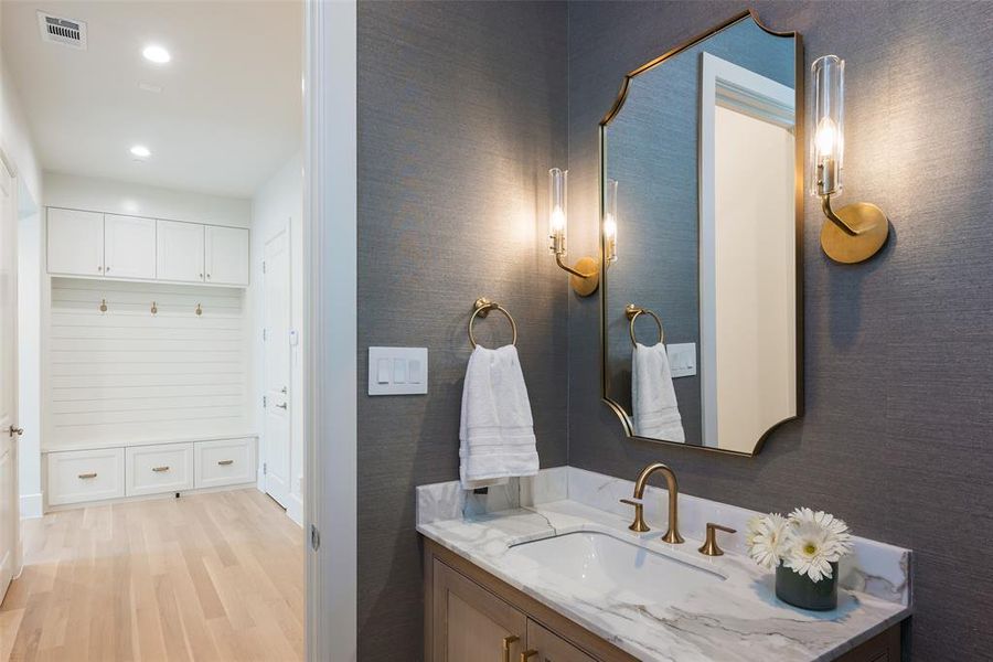 Bathroom featuring wood-type flooring and vanity