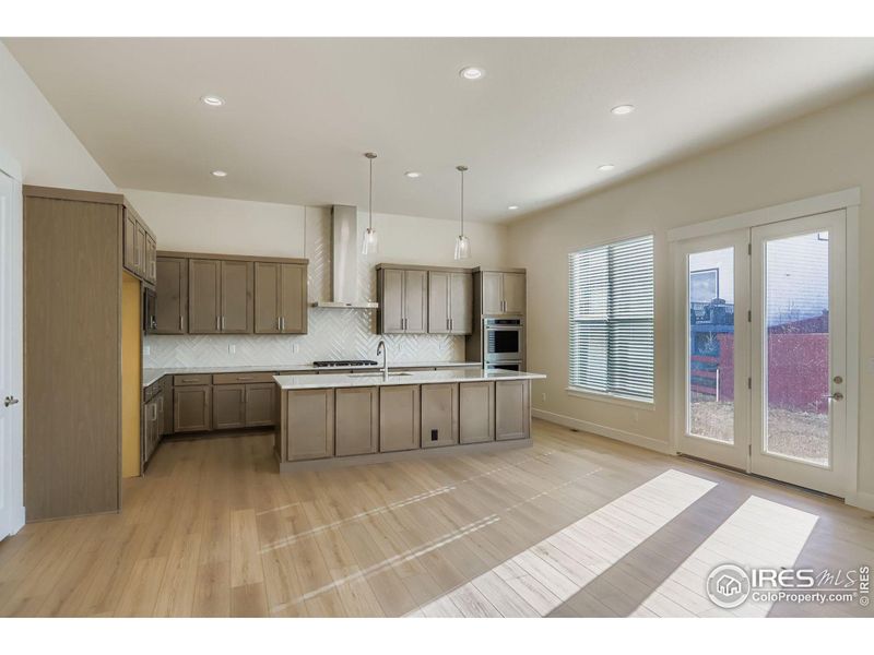 Furnished interior view inside a new home in RainDance National 60/70, Windsor (Image 12).
