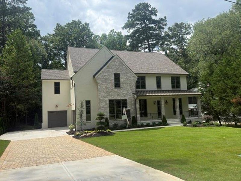 Front exterior of a new home in , Atlanta, GA, highlighting curb appeal (Image 1). Front exterior of a new home in , Atlanta, GA, highlighting curb appeal (Image 1).