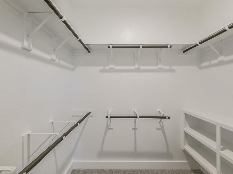 Spacious, unfurnished interior of a new home in Sunterra, Katy (Image 32).