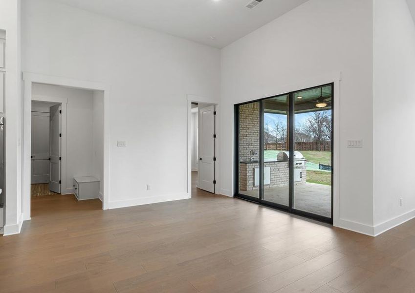 The open breakfast area has plenty of natural light from the sliding back doors.