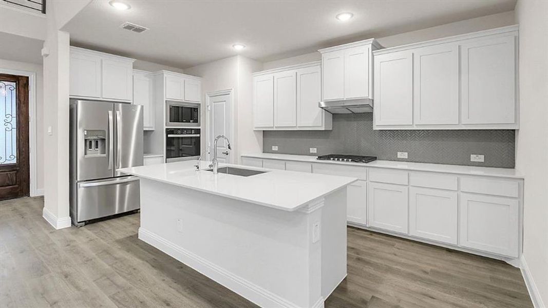Furnished interior view inside a new home in The Landing at Hidden Lakes, McKinney (Image 3). Furnished interior view inside a new home in The Landing at Hidden Lakes, McKinney (Image 3).