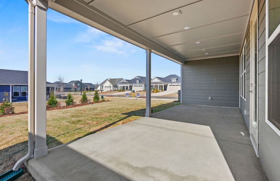 Exterior details and patio area of a home in Carolina Riverside, Belmont (Image 3).