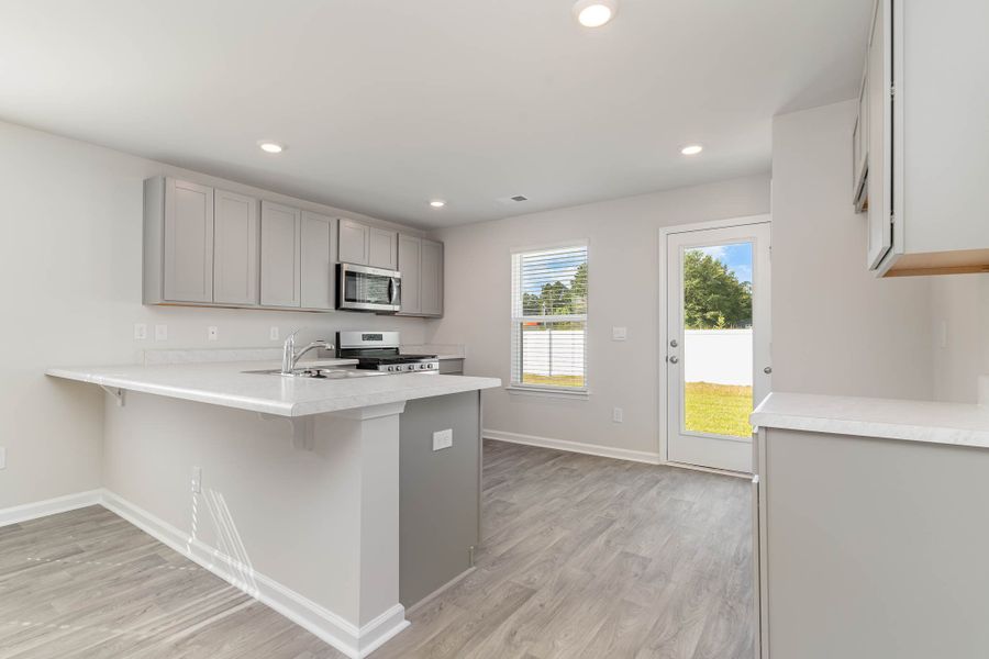 Representative furnished interior of a home built from the Plan by D.R. Horton in Auberon Woods, Conway (Image 5). Representative furnished interior of a home built from the Plan by D.R. Horton in Auberon Woods, Conway (Image 5).