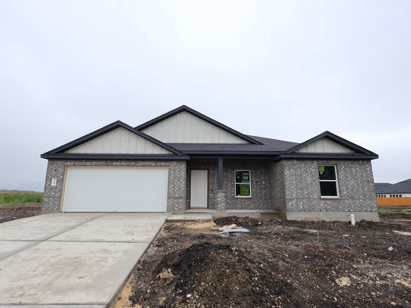 In-progress construction of a new home in Carillon, Manor, TX (Image 3).