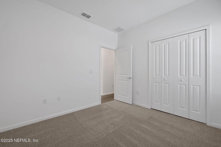 Spacious, unfurnished interior of a new home in TrailMark, St. Augustine (Image 29). Spacious, unfurnished interior of a new home in TrailMark, St. Augustine (Image 29).