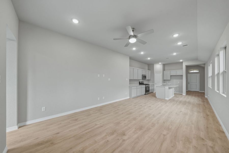 Dining and Living Area in the Cedar home plan by Trophy Signature Homes – REPRESENTATIVE PHOTO Dining and Living Area in the Cedar home plan by Trophy Signature Homes – REPRESENTATIVE PHOTO