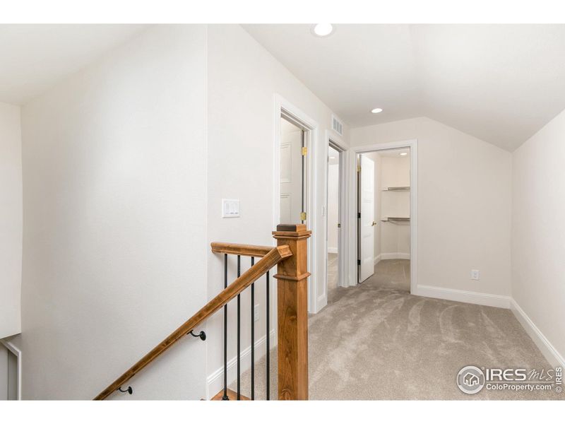 Upstairs leading to the second and third bedrooms