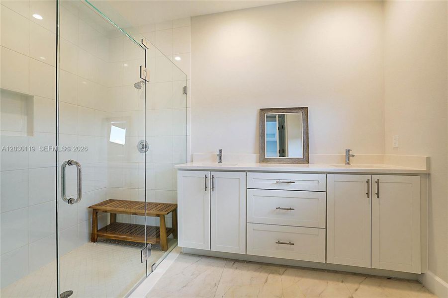 Primary Bathroom with Dual Sinks and Shower