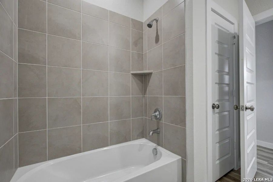 Furnished interior view inside a new home in Hacienda, San Antonio (Image 8).