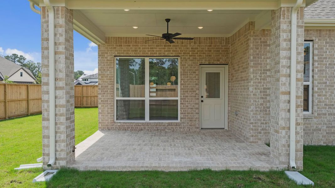Exterior details and patio area of a home in Evergreen 40s, Conroe (Image 3). Exterior details and patio area of a home in Evergreen 40s, Conroe (Image 3).