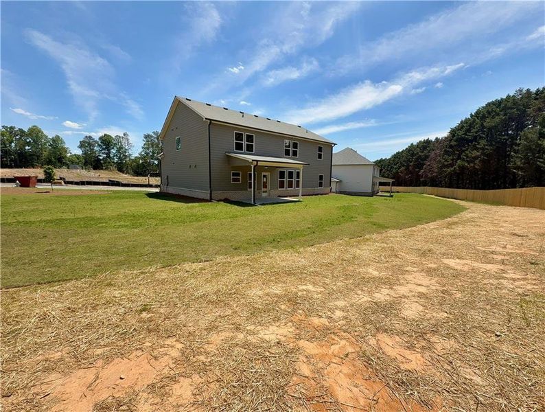Exterior details and patio area of a home in , Hoschton (Image 23).