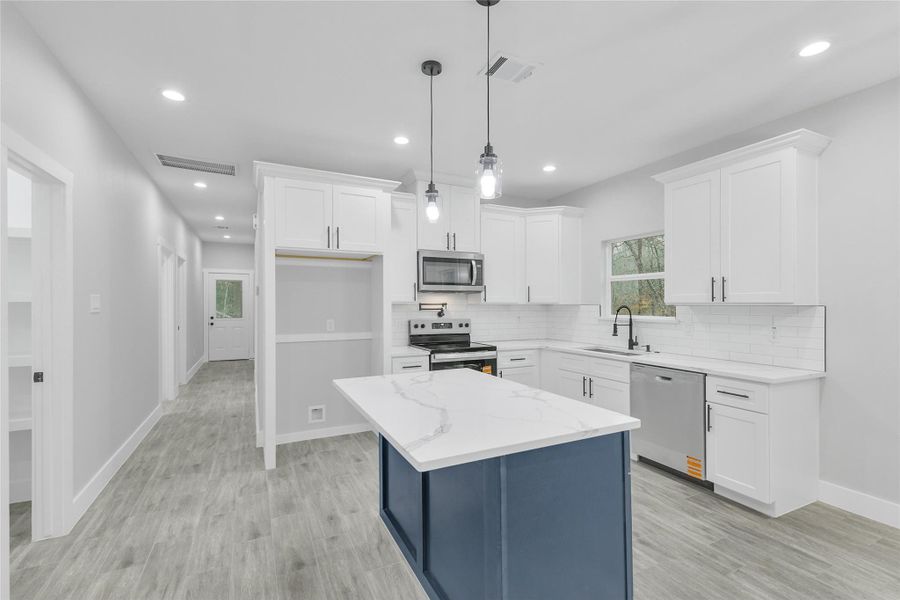 Furnished interior view inside a new home in , Willis (Image 11).