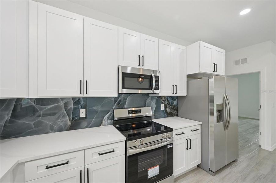 Furnished interior view inside a new home in , North Port (Image 8).