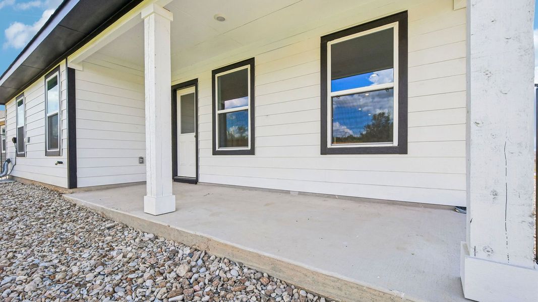 Exterior details and patio area of a home in Trails at Wildhorse, Austin (Image 4).
