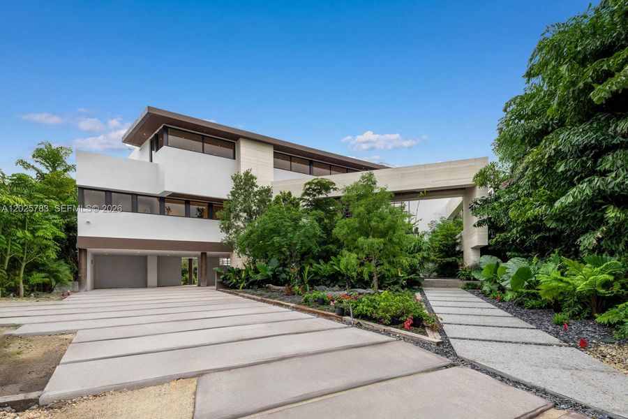 Front exterior of a new home in , Coral Gables, FL, highlighting curb appeal (Image 2). Front exterior of a new home in , Coral Gables, FL, highlighting curb appeal (Image 2).