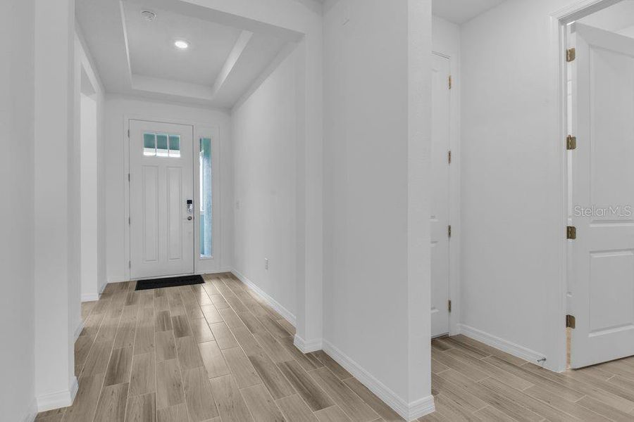 Spacious, unfurnished interior of a new home in Ardisia Park, New Smyrna Beach (Image 36).