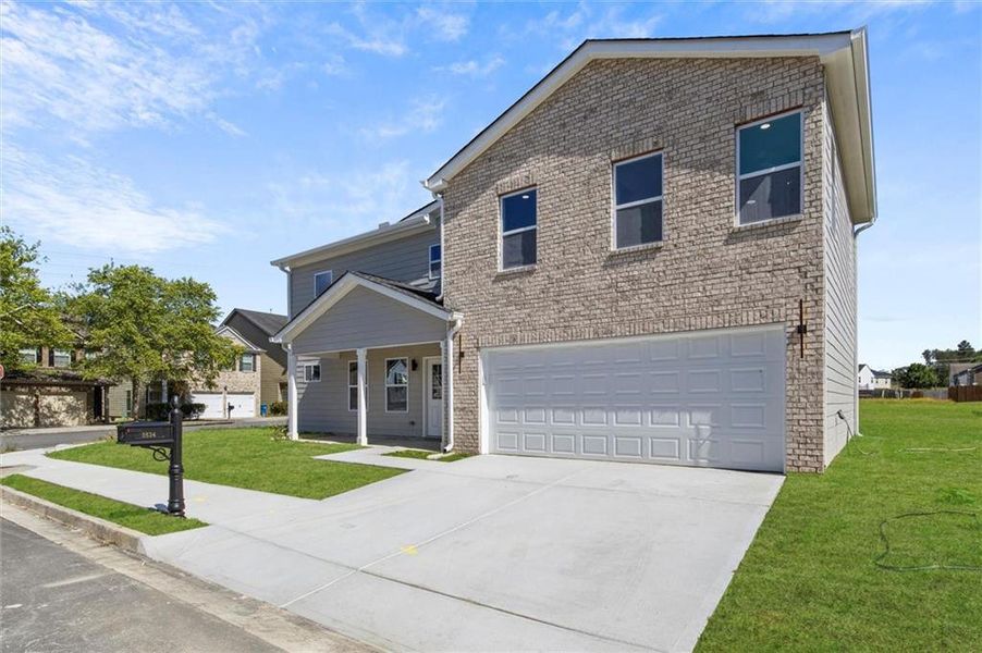 Front exterior of a new home in , Fairburn, GA, highlighting curb appeal (Image 21). Front exterior of a new home in , Fairburn, GA, highlighting curb appeal (Image 21).