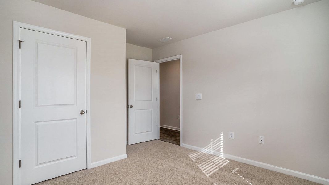 Spacious, unfurnished interior of a new home in Meadow Walk, Loris (Image 12).