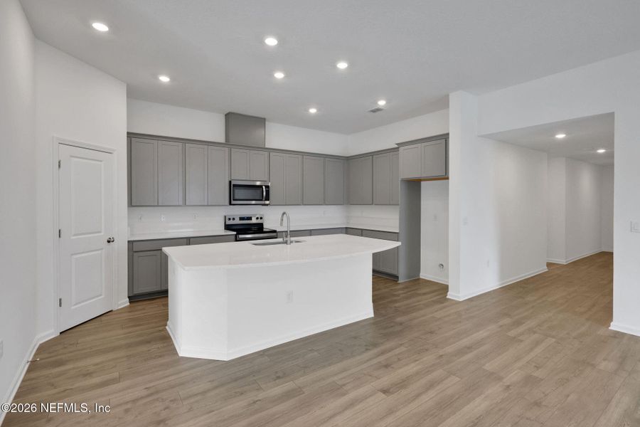 Furnished interior view inside a new home in Amberly, Green Cove Springs (Image 9).
