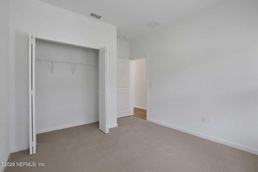 Spacious, unfurnished interior of a new home in Hyland Trail, Green Cove Springs (Image 50).