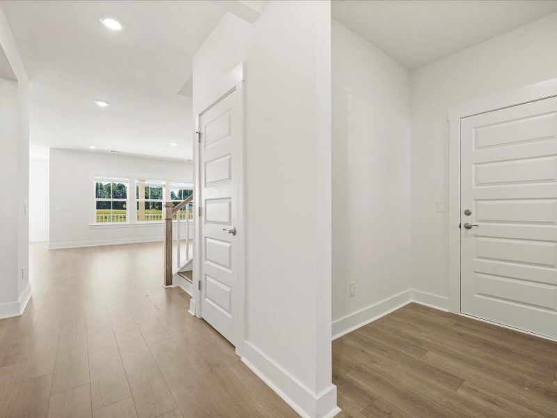 Spacious, unfurnished interior of a new home in The Coves at Lakes of Cane Bay II, Summerville (Image 17).