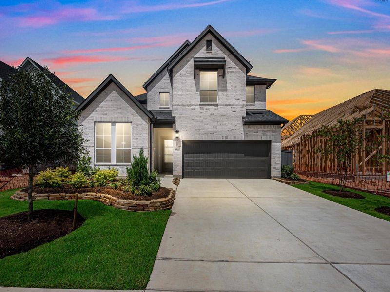 Front exterior of a new home in Jubilee 50′, Hockley, TX, highlighting curb appeal (Image 2). Front exterior of a new home in Jubilee 50′, Hockley, TX, highlighting curb appeal (Image 2).