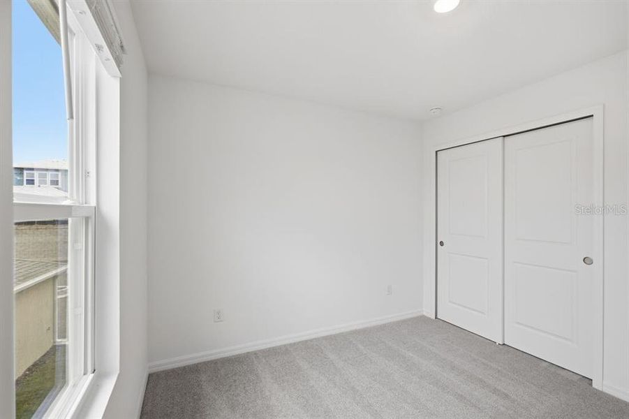 Spacious, unfurnished interior of a new home in Waterstone, Groveland (Image 33).