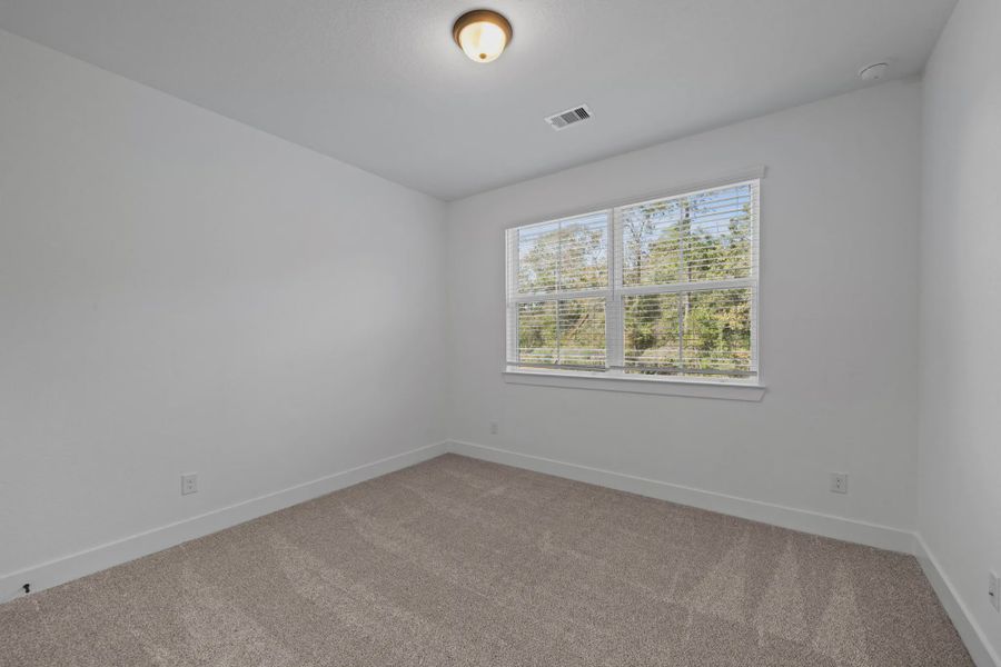 Spacious, unfurnished interior of a new home in The Woodlands Hills, Willis (Image 24).
