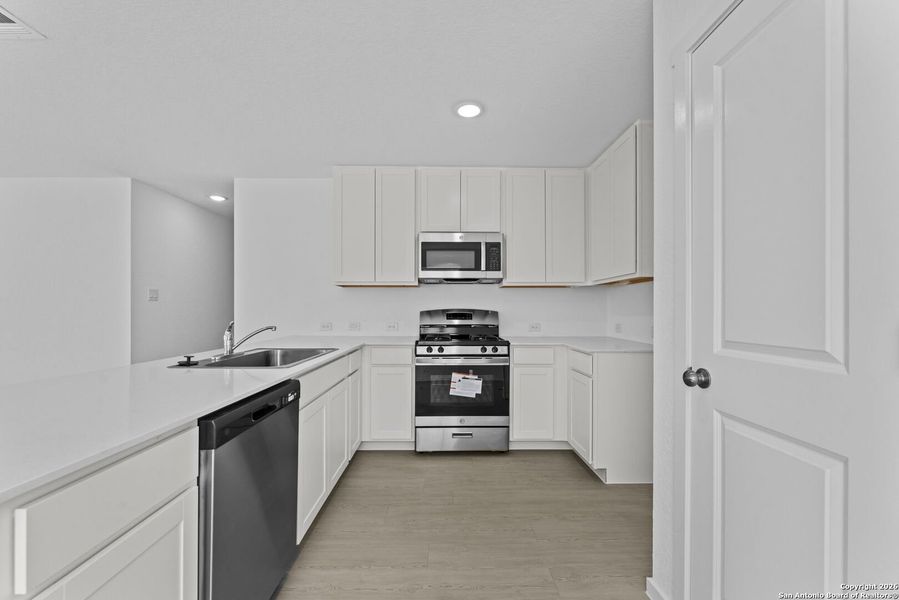 Furnished interior view inside a new home in , New Braunfels (Image 8).