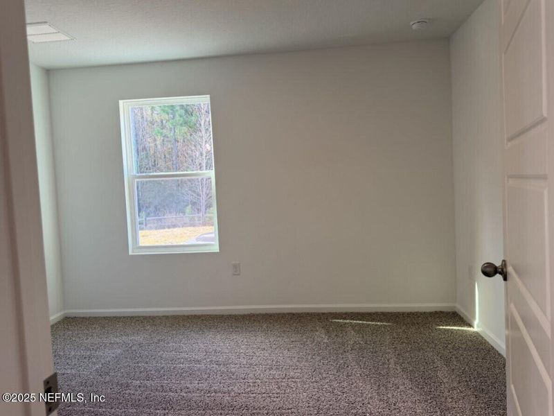Spacious, unfurnished interior of a new home in The Arbors, Jacksonville (Image 18).