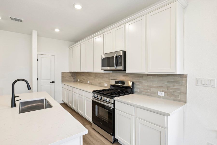 Furnished interior view inside a new home in Freedom at Anthem, Kyle (Image 12). Furnished interior view inside a new home in Freedom at Anthem, Kyle (Image 12).