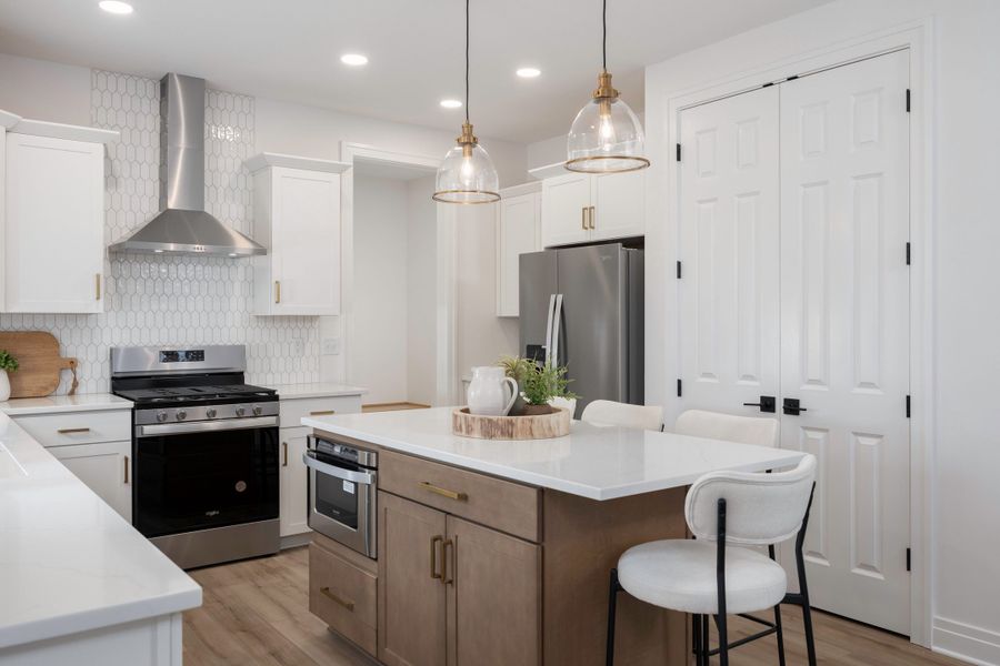 Representative furnished interior of a home built from the The Cambridge by Forbes Capretto Homes in Cannon Woods, Clarence (Image 11).