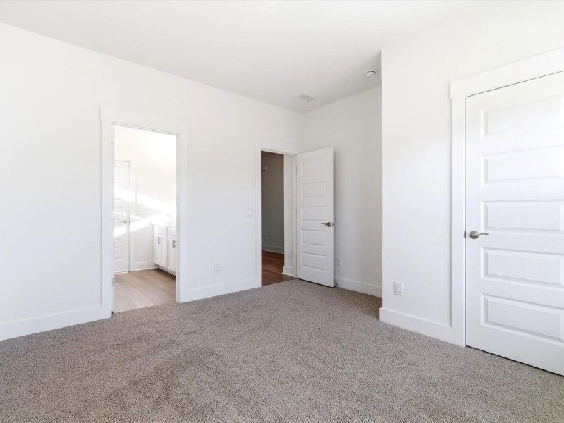 Spacious, unfurnished interior of a new home in The Coves at Lakes of Cane Bay, Summerville (Image 40). Spacious, unfurnished interior of a new home in The Coves at Lakes of Cane Bay, Summerville (Image 40).
