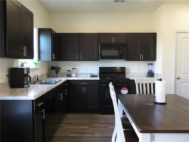 Furnished interior view inside a new home in , Cartersville (Image 3).