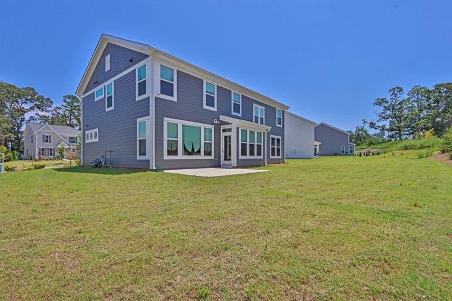 Exterior details and patio area of a home in Sweetbay Farm, Lawrenceville (Image 22).