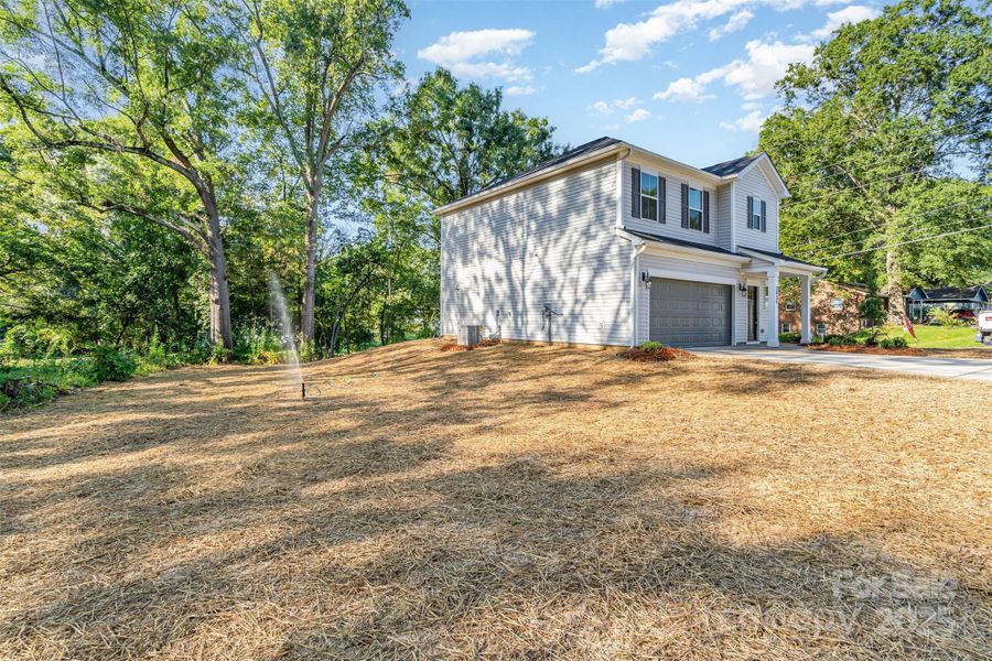 Front exterior of a new home in , Gastonia, NC, highlighting curb appeal (Image 18). Front exterior of a new home in , Gastonia, NC, highlighting curb appeal (Image 18).