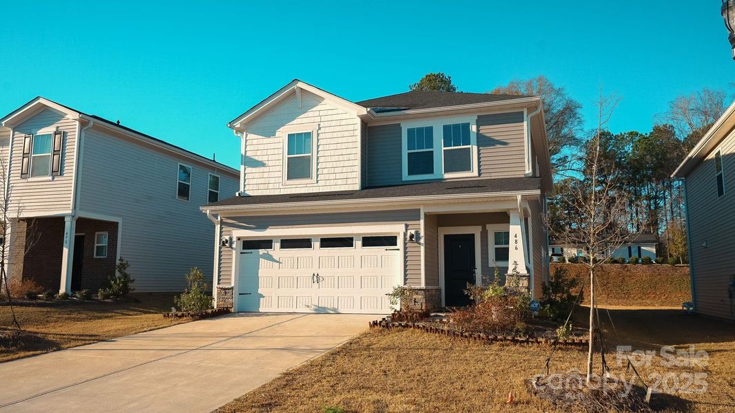 Front exterior of a new home in , York, SC, highlighting curb appeal (Image 1).