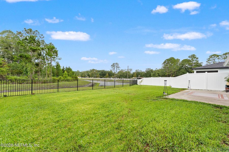 Exterior details and patio area of a home in Bradley Creek, Green Cove Springs (Image 2). Exterior details and patio area of a home in Bradley Creek, Green Cove Springs (Image 2).
