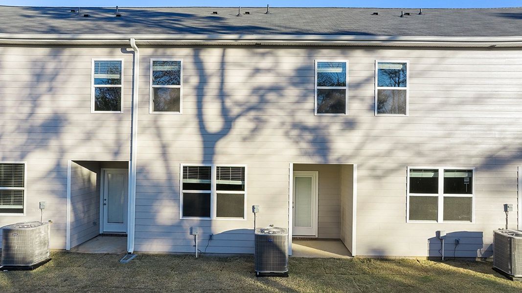 Exterior details and patio area of a home in Laurel Park Townhomes, Hephzibah (Image 3).