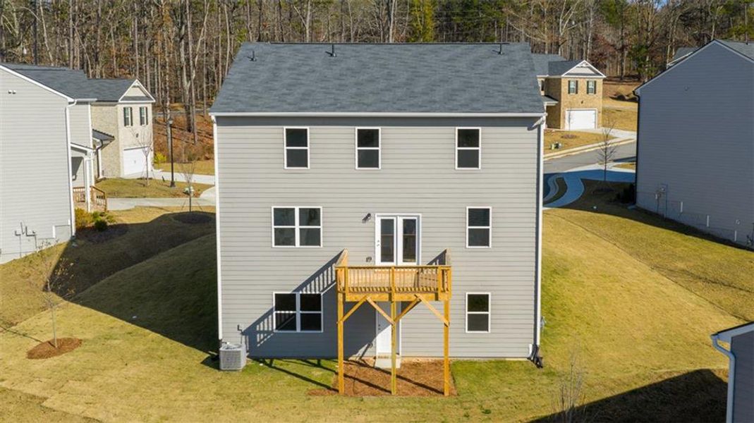 Exterior details and patio area of a home in Brooks Village, Dacula (Image 18).