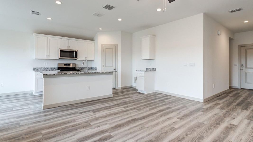 Representative furnished interior of a home built from the The Ashburn by D.R. Horton in Allen Farms, Lubbock (Image 6).