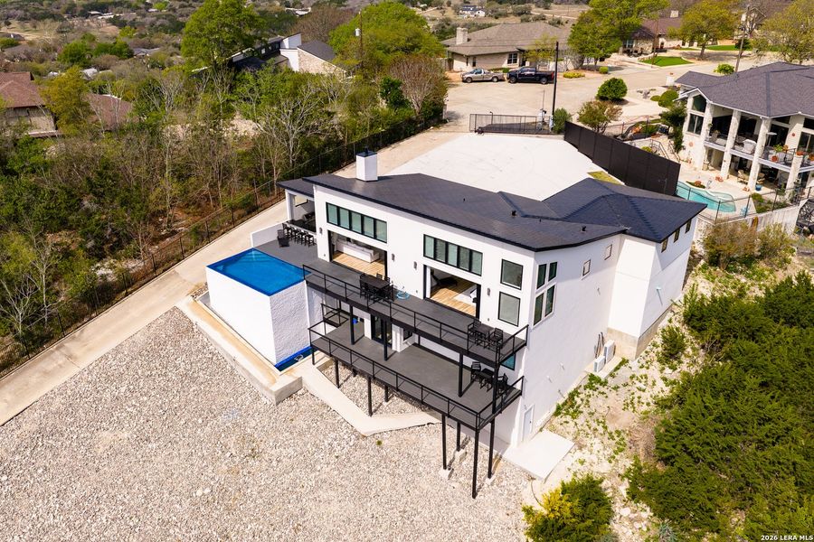 Exterior details and patio area of a home in , Kerrville (Image 39).