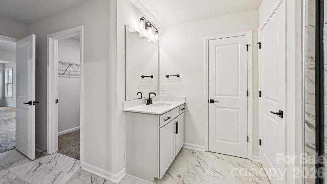 Furnished interior view inside a new home in Sylvan Creek, Denver (Image 11).