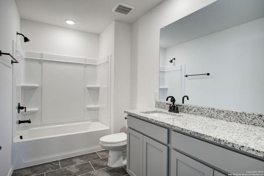 Furnished interior view inside a new home in Comanche Ridge, San Antonio (Image 57).