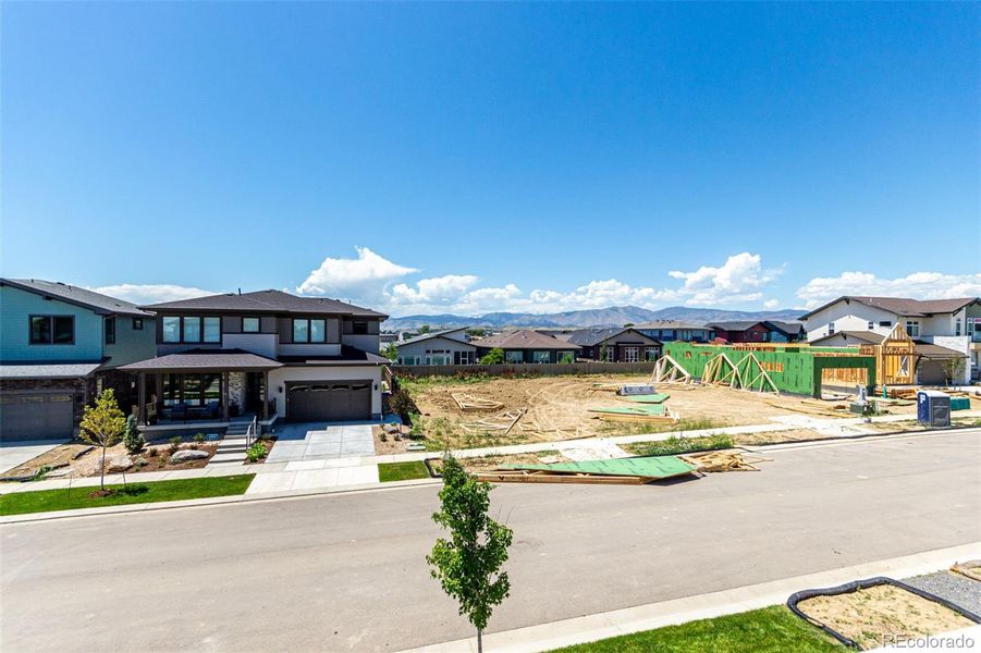 Front exterior of a new home in West Grange, Longmont, CO, highlighting curb appeal (Image 30).