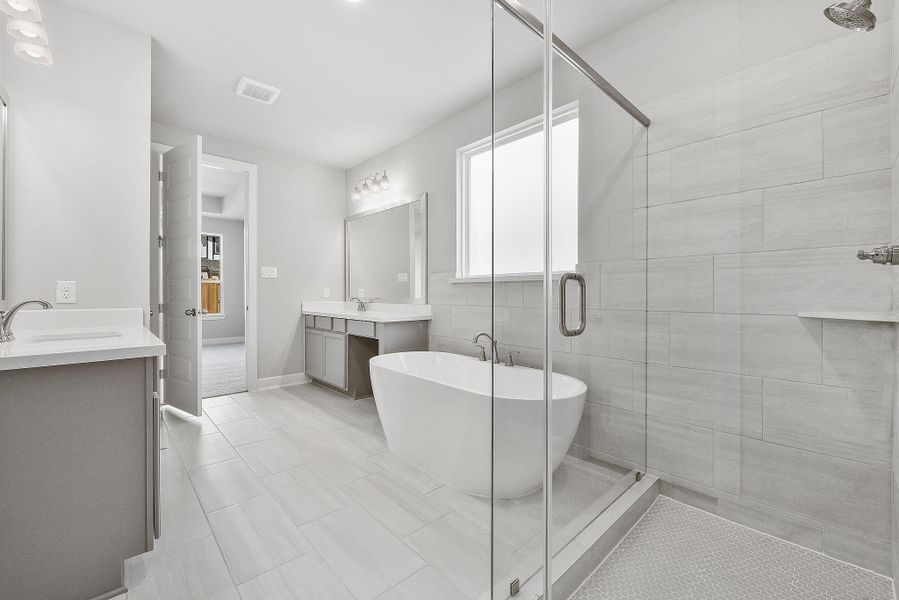 Furnished interior view inside a new home in Sunterra, Katy (Image 16).