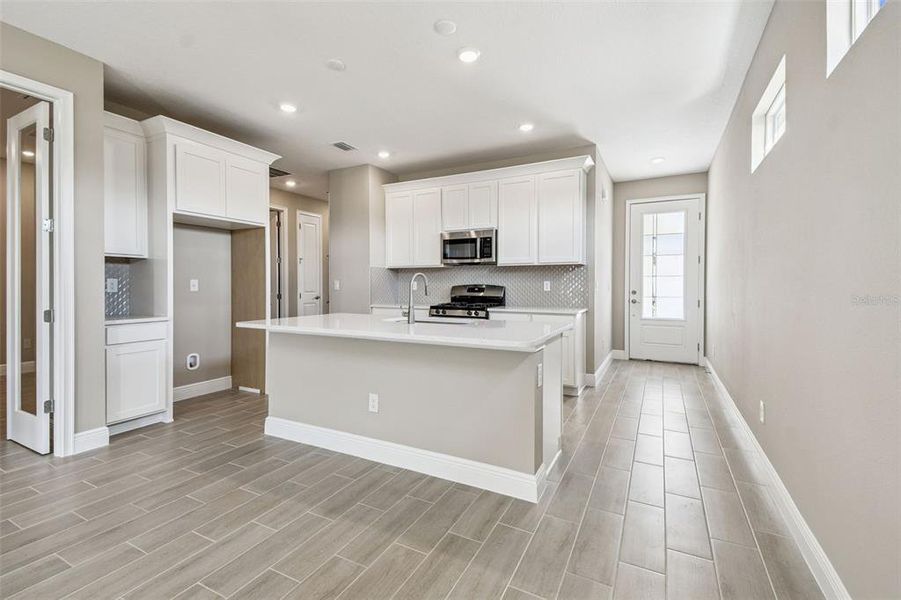 Furnished interior view inside a new home in Fairway Pointe - 55+ Villa Community, Sun City Center (Image 7).