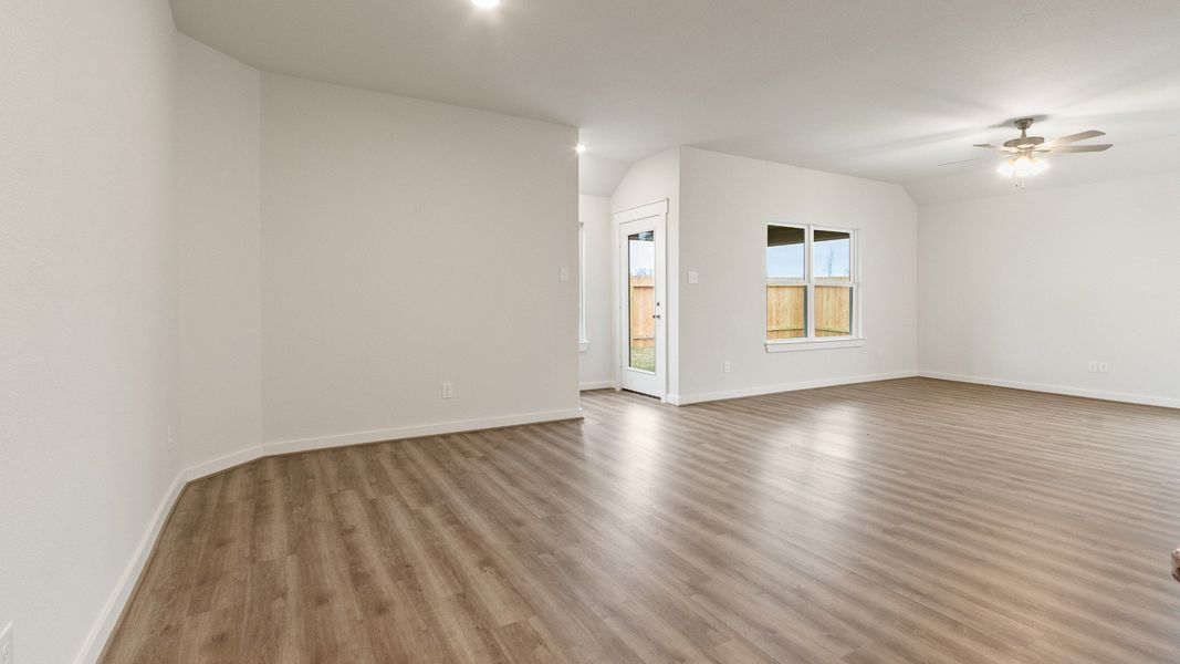 Representative furnished interior of a home built from the Driskill by Brightland Homes in Sunterra, Katy (Image 6).